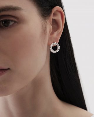 KALEVALA Circle of light - Örhängen i brons